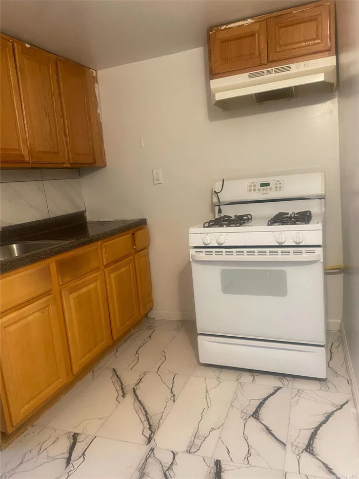 Great investment legal five family 3 units vacant income producing property Pro forma $12, 500 income per month . 1st floor -2 1Bedroom apartments 2nd flooor - 2 studios and 1 bedroom apartment>Blocks from the beach.