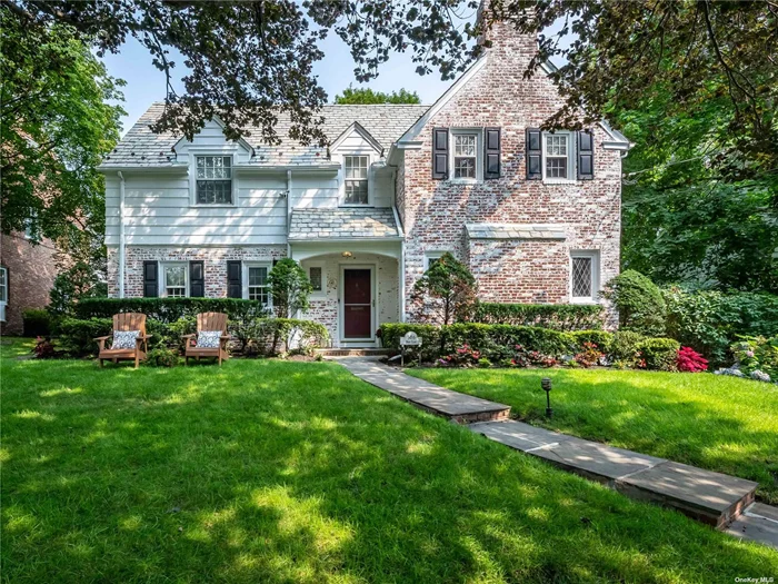 Prepare to be enchanted -- a home like this doesn&rsquo;t come on often ... One of the prettiest properties in Munsey Park has hit the market, with an interior beauty matching the expectations set by its timelessly elegant exterior. Just down the road from Munsey Park Elementary School sits this exquisite Colonial, evocative of an English Manor home, with stunning weathered brick, striking multi-dimensional roof lines and just a few well-placed original leaded glass windows to maintain the authenticity and warmth of this stately property. On the first floor you&rsquo;ll find a spacious entry foyer, leading to the grand living room with fireplace, formal dining room, and the center of the home: the large, open light-filled kitchen/great room, with ample space for a huge farm table and an oversized yet cozy family room. An updated powder room completes the main floor. Upstairs are 5 large bedrooms and 2 full baths including the primary suite, with en-suite bath boasting 2 sinks, soaking tub and separate shower. There are stairs up to a full, floored attic. The basement boasts a huge mudroom with multiple cubbies, offering plenty of space for all, plus a second family room, full bath, exercise room, laundry, and access to the 2 car garage with charging station. The back yard is spacious and flat, and features a lovely, tiered stacked-stone wall with beautiful planting beds, as well as two slate patios. A very special home indeed.