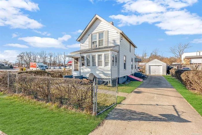 Unique Purchase. Price includes 2 separate homes and vacant land all together. Can keep 2 houses or zoned commercial for 3, 000sqft building with plenty of parking. Located across street from RXR station.