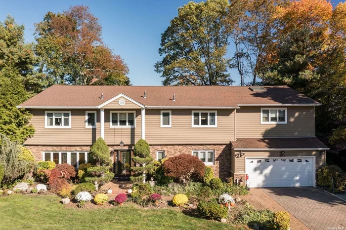 Set on 1/2 acre in the Heart of Country Estates, this expanded 5 BR/4 Bath colonial is the home you&rsquo;ve waited for. The main floor checks every box, offering a spacious eat-in kitchen with professional-grade appliances, custom cabinetry, a pantry, and a large breakfast area, a sunlit great room with vaulted ceiling, dining room, den, and bonus sunroom. A convenient en-suite bedroom and full bath complete the main level. Upstairs, the expansive primary suite spans over 900 square feet and offers ample closets, built-ins, and an en-suite bathroom. Three additional bedrooms and two full baths on the second floor. The backyard features a gunite pool, expansive patio, decks and fully fenced in property. Additional highlights include a 2-car garage, full unfinished basement and a whole house generator. Roslyn Schools & Membership to the East Hills Park.