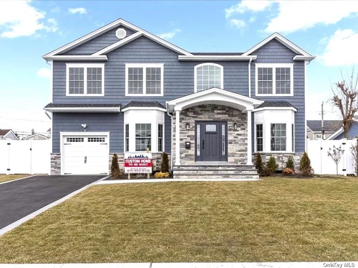100% COMPLETE (as of 3/1/24)-- Brand New Custom Colonial w/9&rsquo; 1st floor AND 9&rsquo; Ceilings in FULL Basement (NO LONGER PERMITTED in almost all new construction homes to-be-built within Town of Oyster Bay zoning, as per recent 7&rsquo; MAX bsmt height bldg code/restriction implemented by ToB Bldg Dept!!!). This Hicksville Gem Features An Open Floor Plan Expertly Designed & Finished With The Utmost Quality of Craftmanship; Designer Kitchen w/SS Appliances; Flawless/Intricate Trim Details Throughout Every Sq Ft; Gleaming Dark Walnut (#1) Oak Floors; First Floor Bdrm/Office & Full Bath; 2nd Floor Master Ensuite w/ W-I-C & Full Bath+ FS Tub; PLUS 2nd floor Junior Suite w/ Private Full Bath; Two Additional 2nd Floor Bedrooms; One Additional 2nd Floor Full (Hall) Bath w/ Bathtub. Many Extras/Upgrades INCLUDED with home, such as Surround Sound & Security System, Upgraded Prof Appliances, Landscaping Pkg w/ UGS, BRAND-NEW FULLY PVC-Fenced Yard, & MUCH MORE. Built By QUALITY Builder of over 400 New Homes over 35+years! Make This Gorgeous Home Your Own So That The Next Door You Open Will Be That Of Your Dream Home.