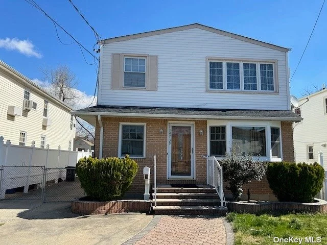 This Home Is A Wonderful Sanctuary 2 Family 4 Bedrooms 3 Fbths On A 40 X 180 Lot. Finished Basement And So Much More. Minutes From JFK..Shopping Malls...And Transportation