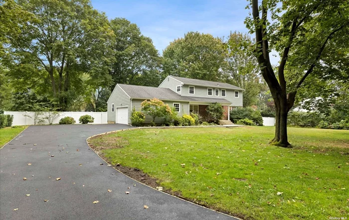 Beautiful turnkey 5 Bedroom, 3 Full Bath, 2 Half Bath Center Hall Colonial on gorgeous, flat, park like 1.05 acre property in the famed Syosset School District or the Half Hollow Hills School District. School bus pickup @driveway! First Floor features: Newly updated Eat In Kitchen which opens to family room with wood burning fireplace and sliders to oversized deck. Large Living Room & Dining Room off the EIK plus 5th bedroom/Office. Second floor features Primary Bedroom Suite with walk in closet. Huge, full, finished basement with half bath. Newly, redone driveway. Gas heating