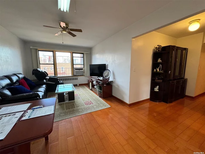 Renovated Jr4 Unit on Top Floor, Located in the Heart of Downtown Flushing. Maintenance Includes All Utilities Except Electricity. A Cozy Foyer Leads the Way to the Closets and A Grand Size Living room; A Gourmet Cook&rsquo;s Kitchen; North-South Air Flow; Next to Living room there is Small room Can be Use Bedroom or Office; Full Bathroom with Tile Floor & Wall; The Master Bedroom Large Enough for A King Sized Bed and Furniture; Hard Wood Floor Throughout; Plenty of Closets: All Rooms with Large Windows. Conveniently Located to Everything You Need. Greenery of Nearby Queens Botanical Garden and Flushing Meadows Corona Park. Wide Selection of Restaurants, Supermarkets and Shopping. Close by MTA# 7 Express, LIRR and Shuttle Van Provide Access to Manhattan, Brooklyn and Long Island.