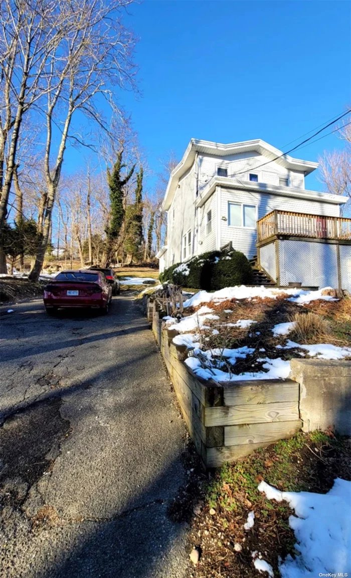 Spacious 4-bedroom, 1 and 1/2 bathroom apartment in the picturesque Port Jefferson area. This spacious apartment boasts ample accommodation for a family or / Roommates. Parking space for up to 3 cars. All utilities included.