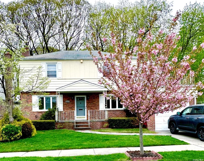 Welcome to this charming detached colonial single-dwelling home! This well-maintained updated residence is conveniently located on an oversized corner lot in Oakland Gardens, facing south. As you approach the house, you&rsquo;ll be greeted by a beautiful Sakura tree right in front. The first floor boasts a bright living room, a brand-new kitchen, a formal dining room, a half-bathroom, and one bedroom. Upstairs, you&rsquo;ll find three additional bedrooms and a full bathroom, along with ample storage space and closets. The fully finished basement offers plenty of flexible space, including a utility room, laundry room, and another full bathroom. Having a stunning yard enclosed by a natural fence of trees ensures complete privacy, you&rsquo;ll find fruit trees and a variety of prized flowers. A private driveway and a car garage. Just one block away, you&rsquo;ll find easy access to Q46, QM6, and QM36 buses, as well as quick access to highways 495, 295, and the Grand Central Highway.