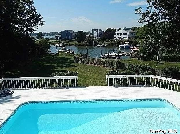 BOATERS WANTED!! Available Monthly July or August thru Labor Day, by the month or Possible MD to LD. Beautiful 2-story, 3 bedroom, 2 bath contemporary w/ CAC Plus in-ground heated 18 X 36 pool overlooking the bay. Multiple outdoor entertaining areas, FLOATING DOCK FOR UP TO 25&rsquo; BOAT with easy access to Tiana Bay,  short drive to ocean and centrally located to all the Hampton&rsquo;s has to offer!!