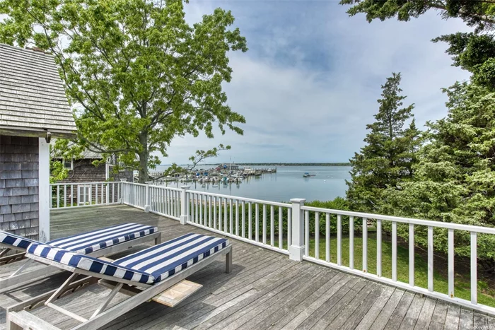 Enjoy living in the crown jewel of Orient Village, the Shaw House built in 1730. Restored & meticulously maintained with original exposed beams, wide-plank floors, period hardware, 3 updated wood burning fireplaces, custom cabinetry & woodwork. 2 large decks span the back of the house overlooking Orient Harbor & Yacht Club. Offered June $15, 000; July 1-20 $25, 000; Sept $15, 000. Permit #0293.