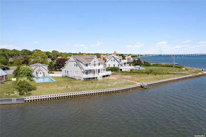 The essence of this waterfront beach houses&rsquo; Southern exposure allows for magical sunrises and sunsets, a 2 minute ride to the ocean and famous Dune Road on the Atlantic Ocean. This home offers a well-appointed kitchen and open floor plan, lovely screened in porch for shade and refreshing breezes. Numerous decks and balconies for sunning, sipping and sitting, 2 fireplaces, lounge and game area. Fenced in back yard with heated saltwater pool and a fire pit allows pets to roam freely while you relax in a serene and private oasis. Yes - Small pets are allowed! With easy access to shopping, WHBPAC, fine and casual dining plus authentic farm stands and 29 nearby vineyards, you&rsquo;ll know you&rsquo;ve found the right vacation destination. Comfortably sleeps 8 people and Memories of a lifetime are guaranteed!