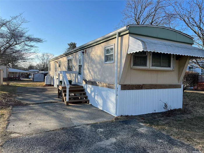Why Rent When You Can Own?! Welcome to 56 Valley Forge Drive, Located in Bunker Valley Community This lovely mobile home offers 2 bedrooms, 1 bathroom, eat-in kitchen, and a den/family area, this home is ideal for those seeking a cozy yet functional living space. The roof was newly installed in July of 2021. Monthly lot fee of $1145, 17. Home is ready for immediate occupancy! Sale subject to Bunker Valley approval.