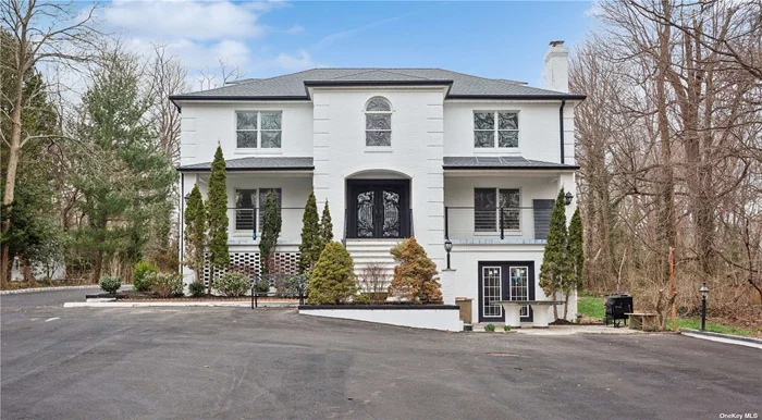 Step into luxury and sophistication in this impeccably renovated Colonial-style home, where no expense has been spared. Nestled in the heart of Fort Salonga, in Long Island&rsquo;s Gold Coast! This enchanting home, boasting a modern design, is a rare find. Built in 1998 and meticulously remodeled in 2023, this home exudes timeless elegance with modern amenities, offering the perfect blend of elegance and contemporary comfort. From top to bottom, this residence has undergone extensive renovations, resulting in a harmonious blend of classic charm and modern convenience. Set on 1.18 acres of lush landscaping, this private oasis is conveniently located just 500 feet from Callahan&rsquo;s Beach Road, granting easy access to miles of pristine beachfront along Long Island Sound. Tucked approximately 200 feet off the road, enjoy unparalleled privacy and tranquility in your own retreat. Step inside and be greeted by a grand two-story open entry foyer. The open-concept design floods the home with natural sunlight, creating a warm and inviting atmosphere. The expansive kitchen, a focal point of the home, is perfect for culinary enthusiasts, featuring ample counter space and modern appliances. Boasting versatility, this property offers separate living quarters at the rear of the home, ideal for guests or extended family members. The lower level offers a walk out basement straight into the driveway, offering plenty of room for entertaining guests. Outdoor living is a delight with a brand new in-ground pool, perfect for cooling off on hot summer days. Entertain your guests on the newly built walk out deck or enjoy the ample amounts of outdoor space surrounded by nature. Parking is never an issue with generous space for 10+ cars and a working three-car garage, providing ample storage for vehicles and outdoor equipment. Don&rsquo;t miss your chance to own this captivating modern colonial home, offering the ultimate blend of luxury, privacy, and convenience in Fort Salonga. Experience the epitome of gracious living in this timeless retreat. Schedule your private tour today!