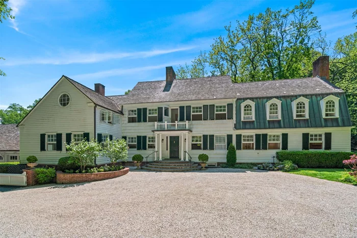Rare opportunity to acquire an exquisitely renovated historic Delahanty Manor on 10 splendidly private acres in the heart of Matinecock. The serene property also offers an exquisitely renovated guest cottage plus new heated 4-bay garage with separate Home Gym/Sauna/Kitchenette/Spa Bath. The restoration of Four Seasons emphasizes harmonious and flexible living while preserving its authenticity and showcasing the natural setting. State-of-the-art folding glass walls flood entertaining rooms with sunlight and panoramic views. Original details and architectural elements blend seamlessly with modern updates. All bathrooms are renovated to a high finish. A spacious Kitchen offers a Breakfast Area, FP and 2 walk-in pantries. The Dreamy Master Suite offers views of the lush grounds. Updated heating and cooling systems, temperature-controlled wine cellar, original hardwood floors and 7 fireplaces. Four Seasons is nature at its best, poised in its own valley with spring-fed ponds surrounded by mature landscaping and woodlands with trails through groves of Beech, Tulip and Oak. The arboretum-like grounds offer a heated Gunite pool, patios, rock gardens and a small caretaker&rsquo;s cottage. The parcel includes one undeveloped five acre lot. Blending indoors with outdoors, old with new, Four Seasons is a an exceptional investment opportunity and an unparalleled residence to live, play, work and enjoy. 30 miles from Manhattan.