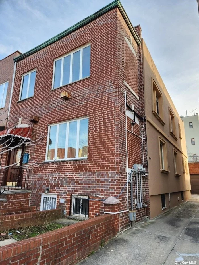 This semi-detached 2-family brick house in Bensonhurst offers a great opportunity. The property features a finished basement with a legal full bath, entertainment area, gym, and laundry. Each apartment has 3 bedrooms, a bathroom, living room, and a separated kitchen with modern amenities. The first-floor apartment is newly renovated, while the second-floor apartment includes stainless steel appliances and hardwood floors. The house is conveniently located near retails, restaurants, shopping, supermarkets, medical offices, and D & N train stations. With a shared driveway and 4 exits, it provides ease of access. The annual real estate tax is $8, 872. Lot:25x100. Building: 21x52. Private garage. Each family has own boiler & heater.