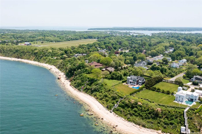 Immaculate shingle-style home perched above the Long Island Sound. Enjoy endless water views and breathtaking sunsets from the heated pool and private beach. Open floor plan with EIK and fireplace, bedrooms across three floors, including first and second-floor primary suites with private waterside balconies. The large finished basement features a media/game room. The private office is ideal for remote work and has a third private waterside balcony-prime indoor/outdoor summer living just a mile from Greenport Village&rsquo;s shops and restaurants. Personal property manager to address any tenant needs. Hamptons luxury with North Fork vibes. Two-week minimum.