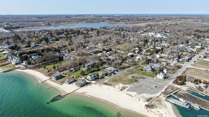Prime residential build lot in highly sought after hamlet of New Suffolk. Enjoy easy water access to sugar sand Bay beach just two blocks from the property, local restaurants within walking distance, public boat ramp and private community garden. The lot is level, cleared and ready to bring your vision to life w/ public water and natural gas in the street. Jump on this incredible opportunity to own one of the last remaining vacant parcels within the New Suffolk community.