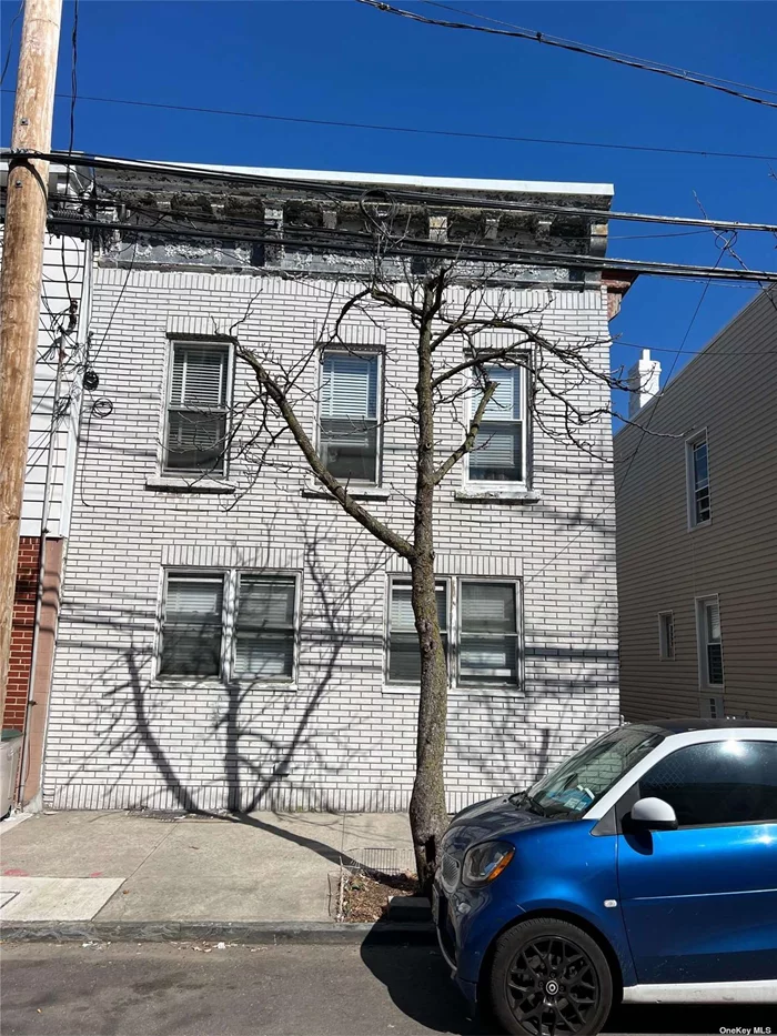 Two Family Property Situated In A Prime Maspeth Location. Full Unfinished Basement. Property Is Sold As Is.