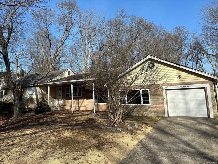 This Property Features 3 Bedrooms, 2 Full Baths, Kitchen, Sunken Living Room With A Wood Burning Fireplace, Formal Dining Room, Den, Sunroom, Finished Basement, A Walk Up Attic, 1 Car Attached Garage & A Huge Fenced Yard. Tons Of Potential!