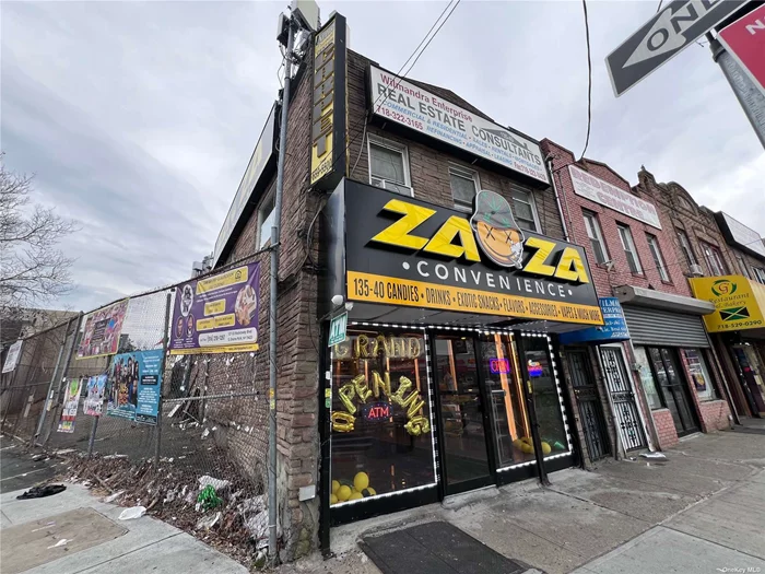 Commercial Building Ideally located at the corner of busy Rockaway Blvd and Van Wyck Expy. Heavy foot and car traffic.