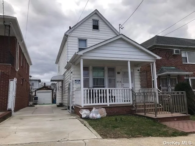 Cozy 1 family in Flushing quiet neighborhood. The owner is a carpenter & plumber who maintains this home sweet home to all the best he can. The next lucky family just needs to bring suitcases to move in right away. Lot size 30 X 100, Building 16 X 36. Interior 1440 SF. 1 Garage. Tax $6800. 1st flr: Lr/Dr, 3 br, 1 ba; 2nd flr: 3 br, 1 ba, 1 Kit; Bsmt: Family Rm, 1 ba, Utility Rm, Laundry Rm, Stair to backyard. Near Flushing Meadows Corona park, PS 120, IS 237, Flushing HS, bus stops, supermarkets, restaurants on Main St. convenient to everything.
