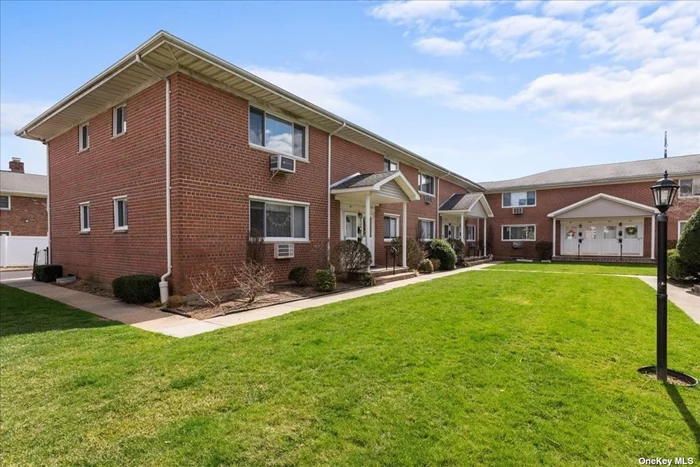 Spacious Second Floor 4 Room Unit in Country Gardens Features One Bedroom and All Great Room Sizes-Living Room Large Enough to Accommodate Separate Dining Area- Country White EIK with Sliders to Private Deck/Balcony- Lots of Closets- Unit has Convenient Dedicated Parking - On Site Laundry Room - Close to Downtown Farmingdale with Lots of Shopping, Restaurants and Transportation.