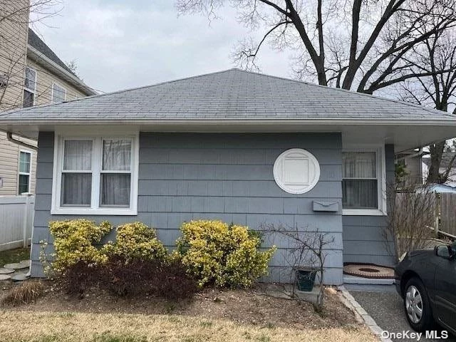 Unique Opportunity to Purchase this 2 Family Home in Manorhaven. Front Unit has 1 Bedroom, 1 Bathroom; Rear Unit is a 2 Bedroom, 1 Bathroom. Hardwood Floors. Nice Backyard, Driveway Parking. (Rear Unit Currently Vacant). Front Unit Can Not Be Shown at This Time - Do Not Disturb Tenant.