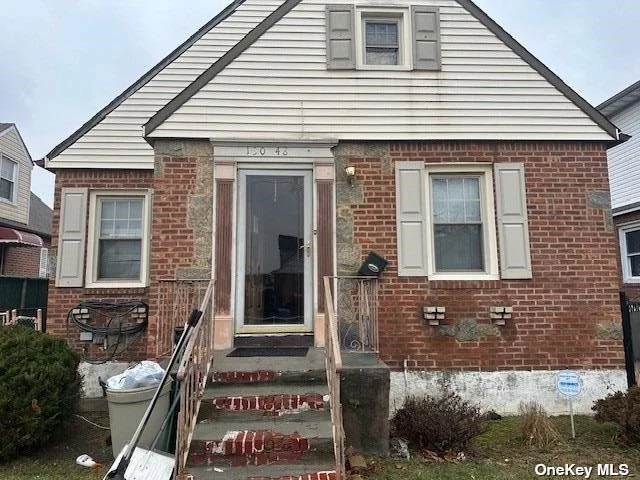 mid block location cape style property,  2 bedrooms upsatairs and 2 bedrooms downstairs, property needs repairs and updating. hardwood floors, sold as is condition
