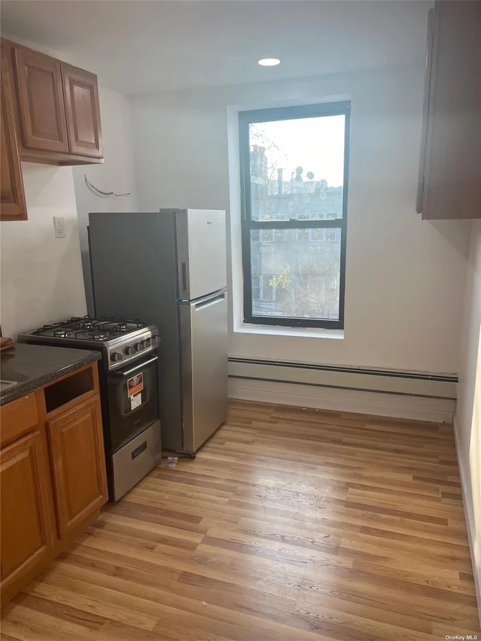 Beautiful Newly Renovated 3 Bedroom, 1 Bathroom Apartment. Hardwood Floor Throughout on the 2nd Floor. Close to Shopping, Public Transportation, School, Place of Worship. Tenant Pays Electricity. Street Parking. Tenant Screening Required.  **THIS IS A NO SMOKING, NO DRUGS, NO PETS APARTMENT.