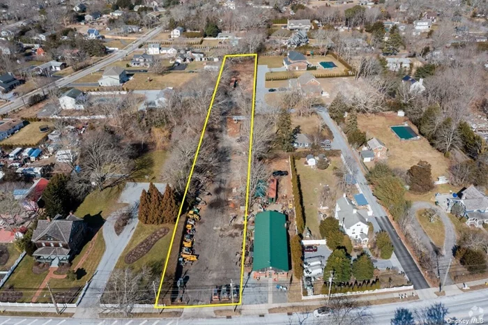 Mixed-use Development Opportunity in East Quogue! 1.01 Acre lot on highly-trafficked Montauk Hwy, which currently has a 2, 512 sq ft Building adjacent to it, now housing a hardware business and equipment rental business, both also for sale. The Land is zoned 54.5% Village Business and 45.5% Residential. Ideal for Contractors, Investors or Developers. Use your imagination to create your own business, or purchase the existing adjacent business and building in this wonderful Hamlet in the Hamptons!