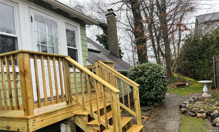Light and bright apartment w/Hardwood floors; featuring Living Room, Bedroom, Eat-in-Kitchen, Full Bath, Porch and small private yard. winter water views. Near Beach.
