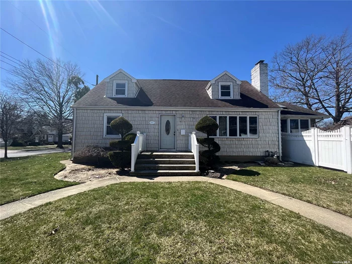 Large Expanded 4 Bedroom Cape. Possible Mother/Daughter with proper permits. Very Large Kitchen with entrance to Yard. Huge Full Finished Basement with bonus. 1.5 Det. Garage.