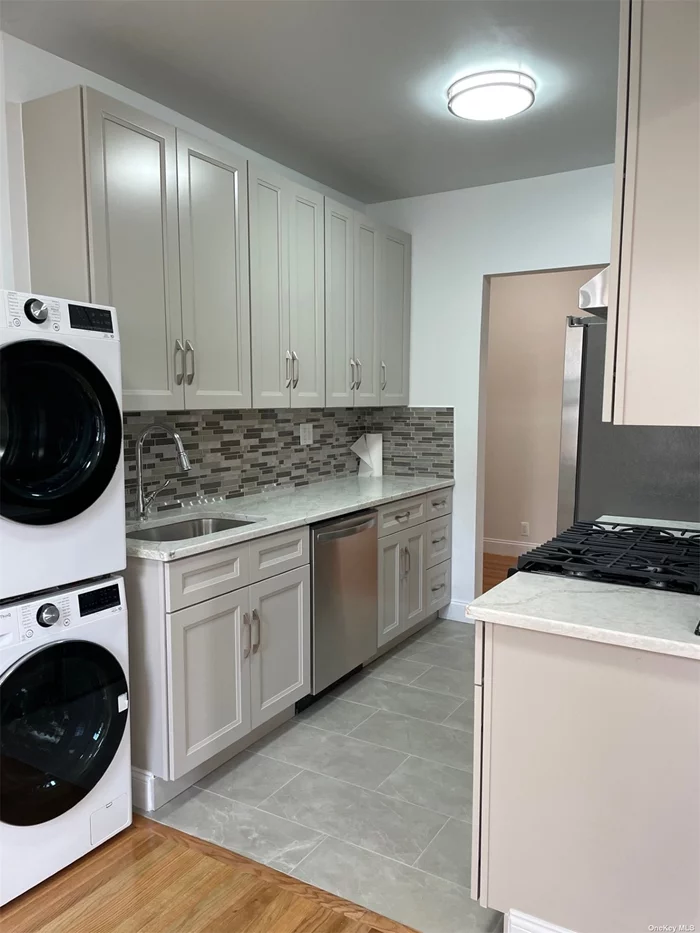 Totally renovated airy and sun drenching over 1300 sqf gem, walk to LIRR, huge rooms, formal dining rm, Grand entrance hall, low tax and maintenance. Heat and water included. Own laundry.