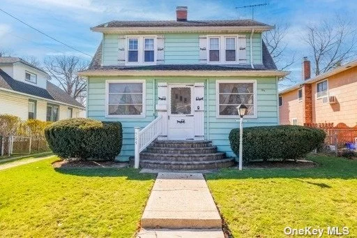 Very Loved family home just blocks from Plaza School and the LIRR. Charming LR with decorative fireplace. Formal DR, Eik, and small pantry on first floor. 3 bedrooms, a full bath, and pull down stairs to a large attic complete the second floor. Nice enclosed porch and parklike oversize property. Large 2 car garage. House is just waiting for someone to make it uniquely theirs. Taxes DO NOT include star. Home sold as is.