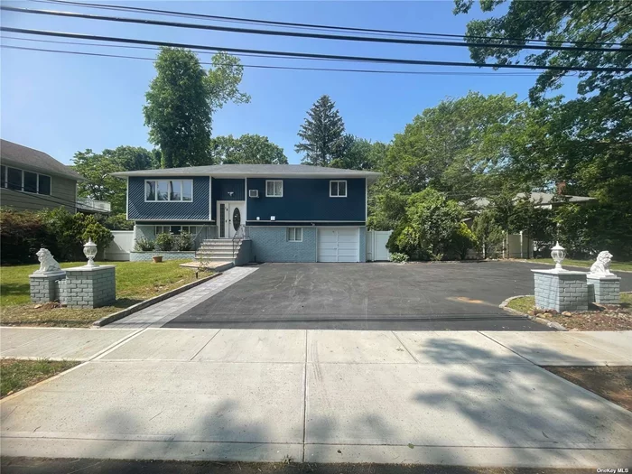 Oversized Property With Beautiful Huge Inground Pool In Best Syosset Woods Section. Mother -Daughter Style (Possibly w Proper Permit Required ) New Renovated Almost Entire House! Whole Property Protected by Ring&rsquo;s Security Cameras System Brand New Opened Kitchen Filled with High-End Appliances, Anderson Windows , New Finished Wood Floors, Brand New Concrete Sidewalk Just Finished as well with Huge New Paved Front Driveway & Parking Lot! .... Near to All!