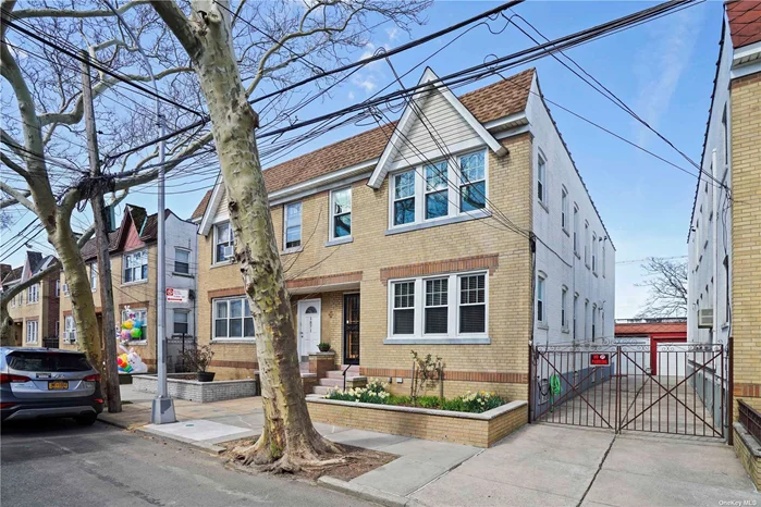 Welcome to 18-73 Hart St, Ridgewood, NY 11385! Nestled on a serene tree-lined block, this semi-attached brick two-family house with a shared driveway and a two-car garage is a gem waiting to be discovered. The first floor offers a cozy two-bedroom apartment with one bathroom, featuring a spacious living room, dining room, and kitchen. Impeccably maintained with original parcay floors, this unit exudes charm and comfort. Step outside onto the walk-out back deck accessible from the rear bedrooms, offering a peaceful retreat. Venture downstairs to find a basement transformed into a delightful recreation area with a convenient half bath, counters, bar sink, and baseboard heating.  Ascend to the second floor to discover a large bright and sunny three-bedroom apartment with one bathroom, ready for you to make it your own.  This property boasts numerous upgrades completed with work permits in 2005, including an oil to gas conversion in 2007 and a new roof installed in 2010. Further enhancements include new skylights, gutters, and roof vents installed in 2012, along with a brick pointing and roof peak re-shingling. All windows were replaced in 2012, ensuring efficiency and functionality. Electrical upgrades have been diligently undertaken over the years, with additional sub panels installed in the basement and garage. Each bedroom, living room, and dining room is equipped with designated 110 A/C outlets for your convenience. Furthermore, a 7.19 kW SunPower Solar system was installed on the main and garage roof in 2012, supplying power to the first-floor apartment, basement, and garage. This system comes with a prepaid 20-year lease, offering peace of mind and energy savings for years to come. Recent updates include a new hot water heater in 2022 and a replacement of the water main in 2023, ensuring optimal functionality and reliability. Conveniently located just half a mile to the Dekalb Stop and 0.7 miles to the Jefferson Stop on the L-train, commuting is a breeze. Close enough to all of the nightlife that Bushwick has to offer, yet tucked away in Ridgewood where you can get your peace and quiet. Whether you&rsquo;re seeking a comfortable home or an investment opportunity, 18-73 Hart St offers the best of both worlds. Don&rsquo;t miss your chance to own this exceptional property in the heart of Ridgewood. Schedule your viewing today!