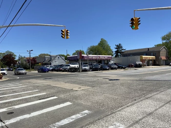 This established and operating automotive dealer has been at this location for approximately 15 years. Complete with 2 Bays, Office, and Storage. At almost a 10, 000 sq ft lot with an approximately 1556 sq ft free standing building and multiple curb cuts this offers the existing use or redevelopment.  ideally located on busy Bellmore Avenue at a signaled intersection with an estimated 18, 000 vehicles passing per day. Owner willing to hold a note to the right buyer.