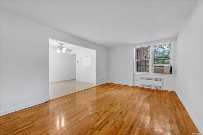 Updated 2 bedroom on the 3rd floor. Located in the heart of Kew Gardens close to shopping, restaurants, park and more. Windows in every room, including kitchen and bathroom. Well maintained building. Low maintenance. Close to the Q10 bus (to JFK Airport) and the LIRR The E/F train is only a short walk. Washer/Dryer in basement. Cat friendly.! Also for rent at $2, 700. All utilities except electric included. Application fee, board approval required.