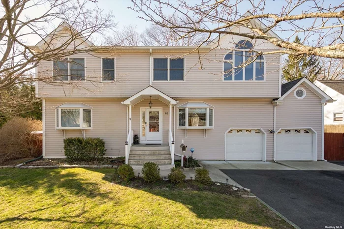Look no further than this HUGE mint Colonial in the heart of Islip! Pull up to your new house and notice the 6-car driveway perfectly set up for storing an RV, boat, or any other oversized vehicle. Car lover&rsquo;s garage with high ceilings and overhead a large storage area. Once inside the front door, you will find a large formal dining room, eat-in kitchen with a spacious breakfast nook. Down the hall, you will find your newly redone half bathroom and large living room. In the partially finished basement, you have a play area, utility room, and laundry. On the second floor, we have central air and 3 bright, large junior bedrooms and a large full bathroom. Down the hall, enter your master en-suite oasis with a huge cathedral ceiling bedroom which includes a large balcony deck overlooking the backyard, walk-in closet, double door closet, huge spa-style bathroom with a full shower and separate Jacuzzi tub. Out in your private backyard, you have a large rear awning patio overlooking the main yard. Off to the side, you have a fully fenced area with a semi-inground pool. This house has it ALL!