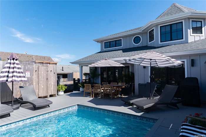 Introducing this stunning, brand-new construction boasting five bedrooms and two and a half bathrooms, complete with a luxurious heated, saltwater pool!
