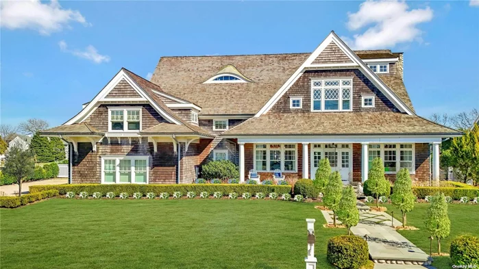 Indulge in the epitome of luxury living at this waterfront sanctuary in West Islip, NY. With its exquisite bay view, this turnkey home is a masterpiece crafted with meticulous attention to detail. Inspired by the movie Something&rsquo;s Gotta Give, this Hamptons-style retreat spans over 5, 700 square feet on a serene half-acre property. Designed by architect Matthew Korn and styled by interior designer Sarah Bartholomew, every aspect of this home exudes elegance. The main level boasts a grand parlor with a soaring 24&rsquo; vaulted ceiling. The heart of the home lies in the blowout kitchen, equipped with Subzero, Wolf & Miele appliances alongside a powder room adorned with Imported Portuguese Tile, a Herbeaux French Faucet, a Pedestal Sink, and Carrera Marble Flooring.? Entertain in the spacious family room featuring coffered ceilings and a gas fireplace flanked by built-in bookshelves. Or retreat to the opulent master suite, complete with built-in cabinetry and a sumptuous master bath with an oversized shower, jet tub & balcony with bay views. Further, three additional bedrooms have an ensuite bathroom & walk-in closet. Beyond lavish living spaces, a mechanical room showcases state-of-the-art features like Radiant Heating, Lochinvar Wall Hung Gas Fired Back Up Heating, Aprilaire Air Purification, 3M Whole House Water Filtration & more. Additional amenities include a full house gas-fired generator and geothermal heating and A/C. Outside, enjoy alfresco living with 200 linear feet of navy-style bulkhead, saltwater gunite pool, cabana with bar, and lush landscaping creating a private oasis. With an array of exclusive outdoor features such as the enclosed outdoor shower, bbq and even a playhouse with a cedar roof, this residence epitomizes luxury coastal living at its finest. Conveniently located just minutes from Babylon Train Station, Fire Island Ferries, and Southward Ho Country Club. This home offers easy access to Manhattan and the Hamptons.