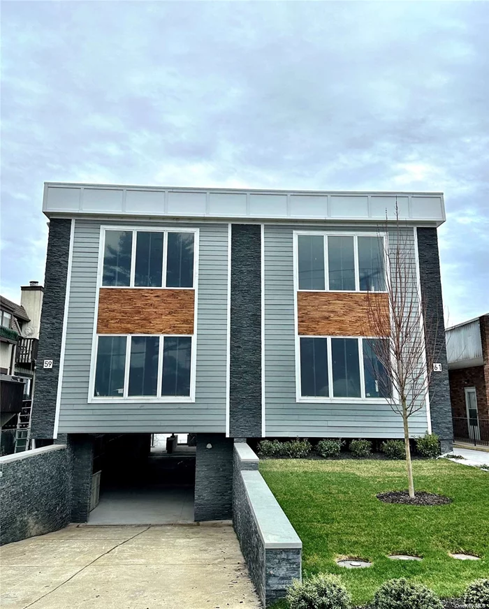 WATERFRONT luxury living at its best. Brand new modern 3 bedroom 2.5 bathroom apartment . Open floor plan. Eat in kitchen, large den with fireplace. Gorgeous balcony overlooking the water. Washer/dryer one car parking spot.