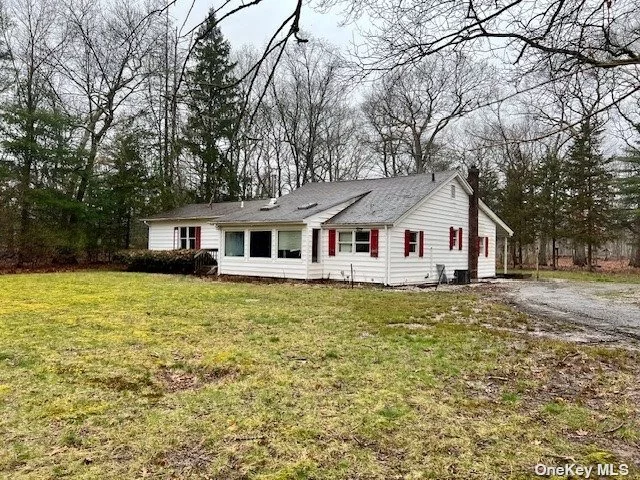Excellent opportunity to own a large 1700 sq ft 4br 2 bath sprawling ranch - possibly mother/daughter on 4.65 private wooded subdivable acres - the house is positioned to be able to stay where it is on the property and can be accompanied by 3 new beautiful houses. Great investment opportunity with wonderful possibilities. FYI the next door property was approx same size- directly to the left is about the same size and now is 4 3000 square ft majestic + homes! Cash Deal Only