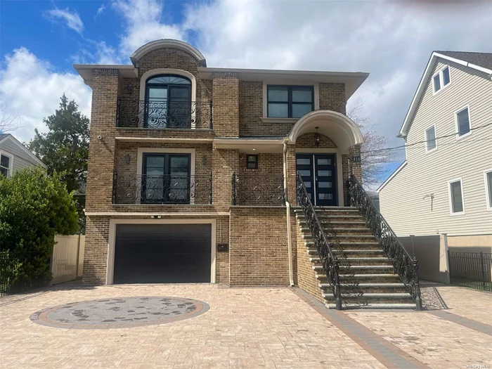 Magnificent Home in the Heart of Woodmere. Constructed in 2020. 7 Bedrooms, 4 Full Baths, Detailed Moldings Throughout, Deck Off Dining Room, Maple Wood Floors, Anderson Windows + Doors, Custom Closets, Dimmers & Timers, 2 Zone CAC. Eat-In-Kitchen with 2 Sinks, 2 Dishwashers, 2 Microwaves, Double Oven, Island, Sound System, Camera System & 4 Car Driveway.