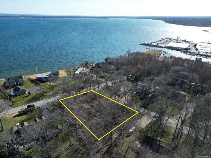 Dream Big and build your dream home in the coveted Southold Shores! This wooded lot is nestled in a private community and is situated directly across from the bay with access to a private beach with deeded rights. This location is conveniently close to town, providing easy access to an array of amenities including shops, restaurants and wineries. Don&rsquo;t miss out on this extraordinary opportunity!