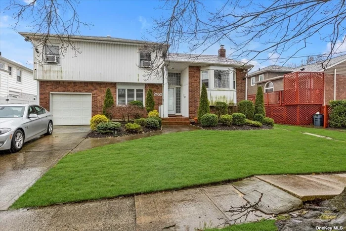 This lovely Home located in Merrick South of Merrick Rd features 3 bedrooms, 2.5 baths , a partial basement, CAC, IGS, 200 AMP, Deck, Eat in Kitchen, Skylights and more. House being sold as is. Bellmore Merrick Schools.