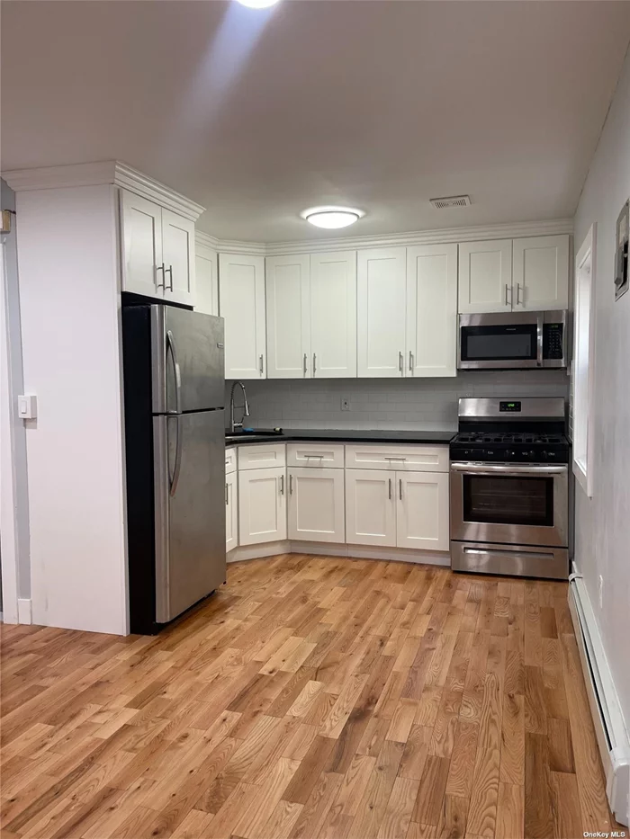 Investment opportunity in Rockaway Beach - 2 Family house conveniently located near the A Train and public beach. Lower unit is 1 bedroom with a full bath and the upper unit is a 2 bedroom with a full bath.