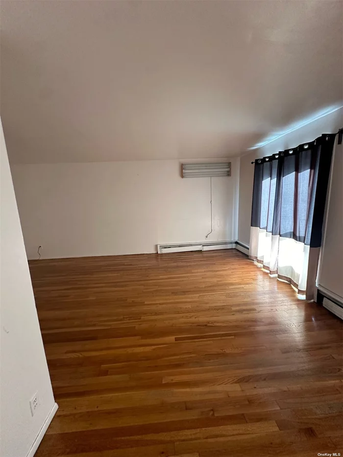 Renovated three-bedroom 1.5 Baths in Rego Park, ideally situated near all amenities. Parking is available for an additional fee. Renovated Kitchen with granite counter-tops. Enjoy the comfort of brand new split units for heating and cooling,