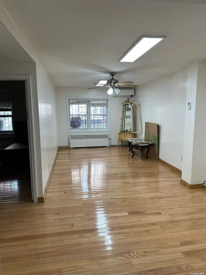 Renovated two-bedroom apartment nestled in the heart of Rego Park. Features a charming backyard for outdoor enjoyment. Enjoy spacious bedrooms and a generously-sized living room. Brand new split units provide efficient heating and cooling. Conveniently located near shops, dining, and transportation hubs.