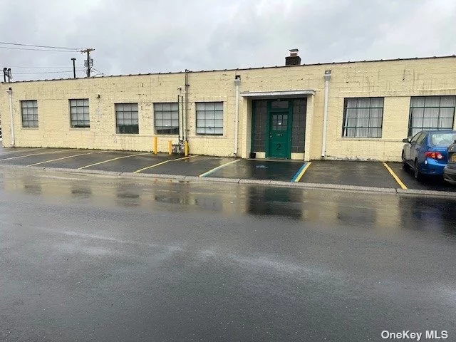 Small Warehouse. Good For Storage, Etc. Gas Heat, Central Air, 1050 Sf. Includes Small Office Space, 1 Bath, 10 Ft High Roll Top Garage Door, 3 Parking Spaces Plus 1 In Front Of Garage Door.