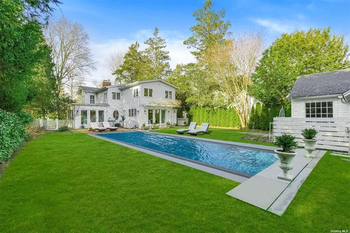 Step into casual charm at 178 South Country Road, nestled in the heart of Bellport&rsquo;s coveted historic village. This impeccably restored 1882 Greek Revival home on .21 acres offers 2, 766 sf of comfortable, cozy and stylish living space across two levels. Discover 4 bedrooms and 2.5 bathrooms, highlighted by a new 14 x 40 heated saltwater gunite pool with automatic cover and pool house. The entrance foyer welcomes you to a stylish library/den and a spacious living room with a fireplace. Natural light graces the formal dining room, while glass French doors in the sunroom/lounge lead to your brick patio and pool, creating a seamless indoor-outdoor lifestyle. The gourmet chef&rsquo;s kitchen, featuring a new Wolf stove and a center island, sets the stage for culinary delights. The left side of the home offers a private office, laundry room, and powder room. The upper-level hosts four stylish bedrooms, one with a fireplace and a full bathroom, alongside a private primary wing. This master suite boasts a newly renovated modern bathroom with a luxury steam shower, double vanity, toto toilets, a spacious bedroom with sitting area overlooking the backyard, and a walk-in closet. Step outside to enjoy the 14x40 heated gunite pool and renovated pool house, complete with A/C, sitting area, and desk. Luscious landscaping package for utmost privacy. Only a few blocks from the Great South Bay. Living here grants exclusive privileges and a sophisticated for residents (and their guests) to take the Whalehouse Point ferry to Bellport&rsquo;s Ho-Hum Beach on Fire Island, while also enjoying golf and tennis at the Bellport Country Club, with subsidized memberships for residents. Embrace the Bellport lifestyle with three nearby farms offering seasonal, outstanding produce, easy access to the town&rsquo;s marina, art galleries, restaurants, renowned shops and an endless array of community-focused social activities. The commute is a breeze, with a 90-minute train ride to Manhattan. Welcome home to unparalleled elegance and convenience.