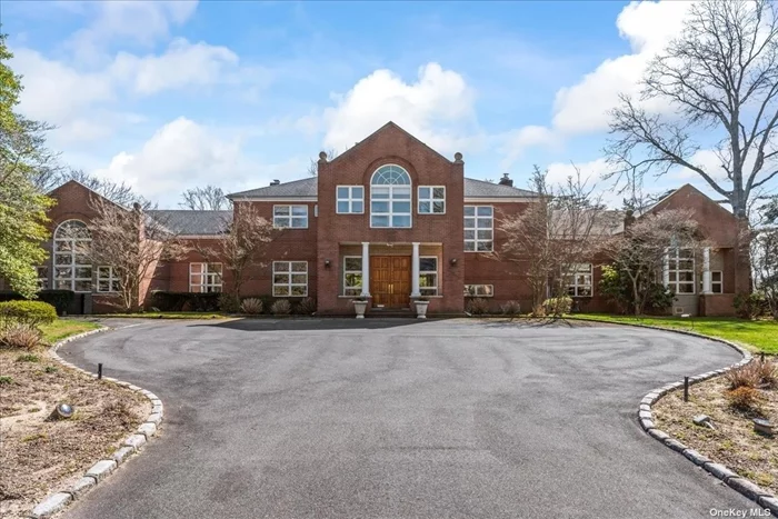 Welcome to this stunning brick colonial nestled on a 1.5 acre property in the heart of Woodsburgh! Additional separately deeded waterfront property sold with the main one includes a dock and shed for boats. The home was originially built in 1906 and underwent a full and complete renovation in 1991, with the original grand entry hall&rsquo;s crown, wainscotting, rails, arches and doors being fully restored to their original glory. Be wowed as you look up almost 30 feet awash in natural sunlight through the clerestory windows at the peak. There are 2 bedrooms and en-suites on the 1st floor, in addition to the full bathroom off the patio for the pool (not being represented as functioning) as well as a massive granite and maple wood kitchen with top of the line appliances, a bright, rear-facing sun room, formal dining room with fireplace, formal living room with fireplace, library, powder room and large laundry room. Moving up to the 2nd floor where each of the 5 bedrooms are oversized and the 3 full baths are very appointed, with the main bathroom have a large jacuzzi tub, 2 sinks and a separate shower and toilet room. The basement has high ceilings, includes 2 gas boilers and a massive hot water storage tank so you won&rsquo;t run out of hot water. There are a total of 4 zones of central air conditioning plus a mini-split for the sun room. When you go to back yard, you&rsquo;ll visit the paddleball court, an enormous grassy expanse, and a large patio for chilling with family and friends. Finally, the piece de resistance is when you take a 1 minute walk around the corner to Ivy Hill Rd and visit your own private dock and boat shed (in need of renovation). This separate property, section 41, block D, lot 65 will be deeded with the sale of 805 Channel Road.